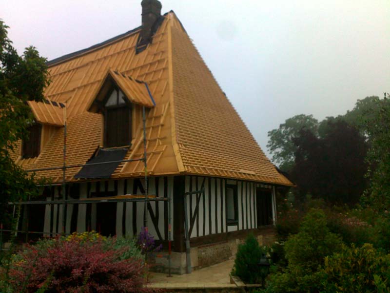 Maison colombage rénovation énergétique isolation bois toiture